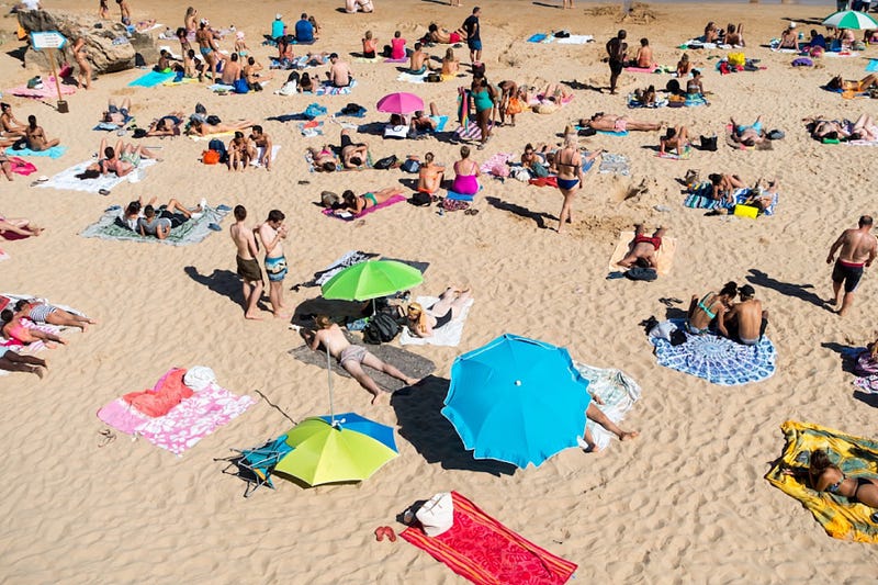 Beachgoers enjoying life authentically