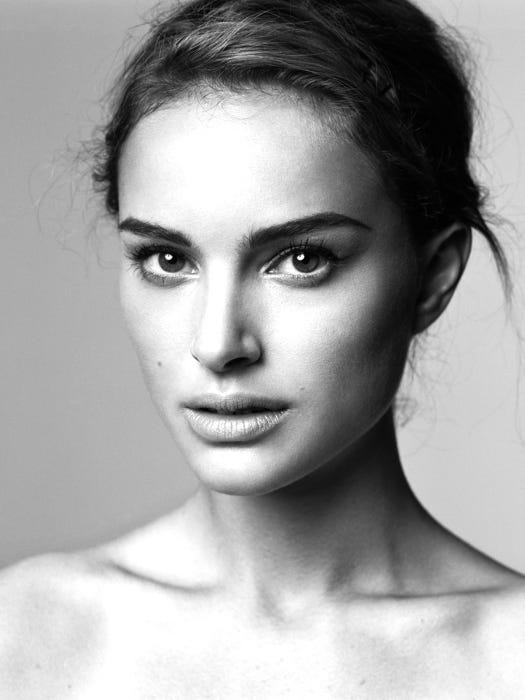 A young woman with a striking resemblance to Natalie Portman.