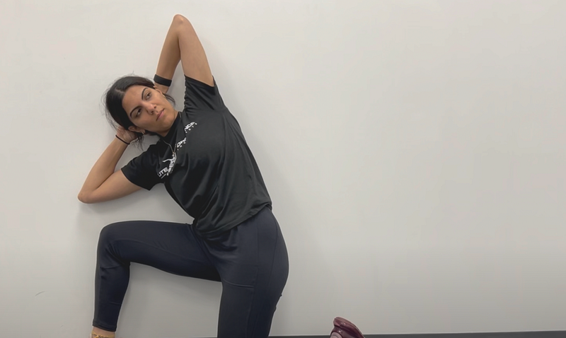 Wall-Assisted Thoracic Rotations Exercise