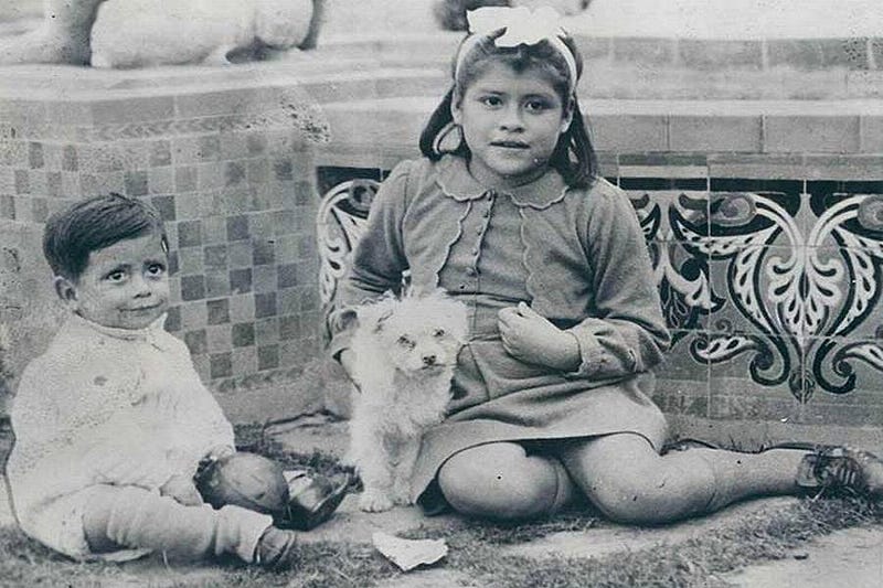 Lina Medina holding her son, Gerardo